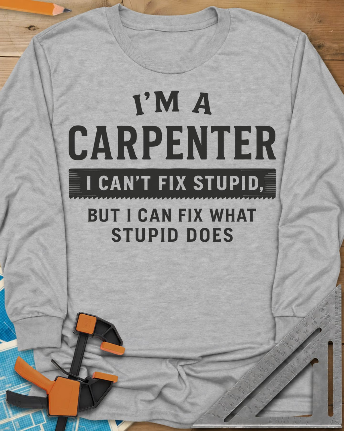 I’m a Carpenter long sleeve shirt in Sport Grey, block lettering with a saw-tooth strip behind the middle line
