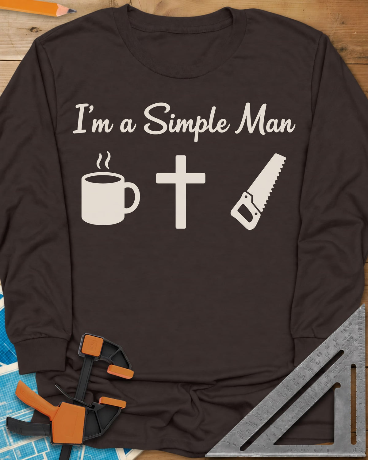 I’m A Simple Man Christian Woodworking long sleeve shirt in Dark Chocolate, script headline above a steaming coffee mug, a