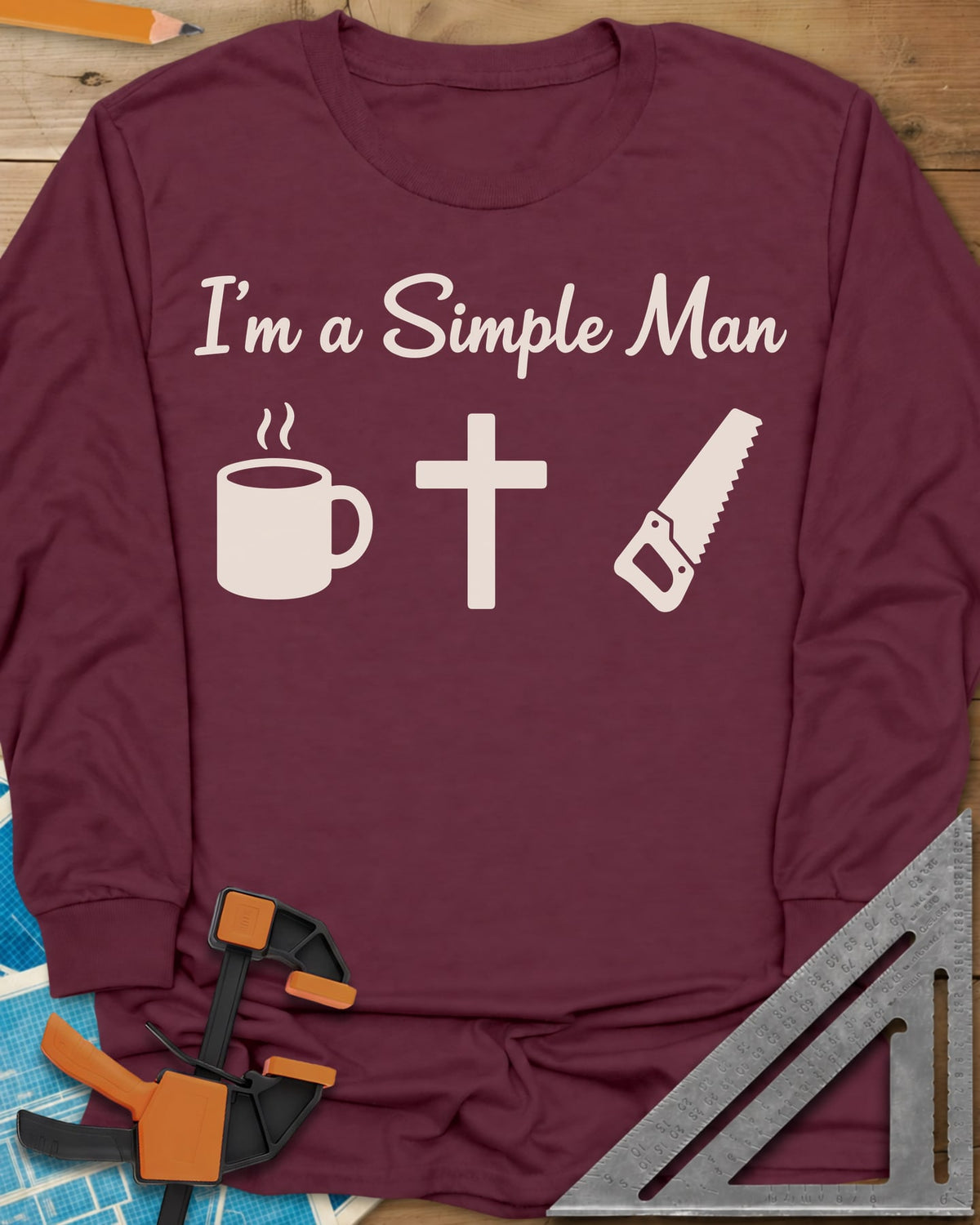 I’m A Simple Man Christian Woodworking long sleeve shirt in Maroon, script headline above a steaming coffee mug, a cross and