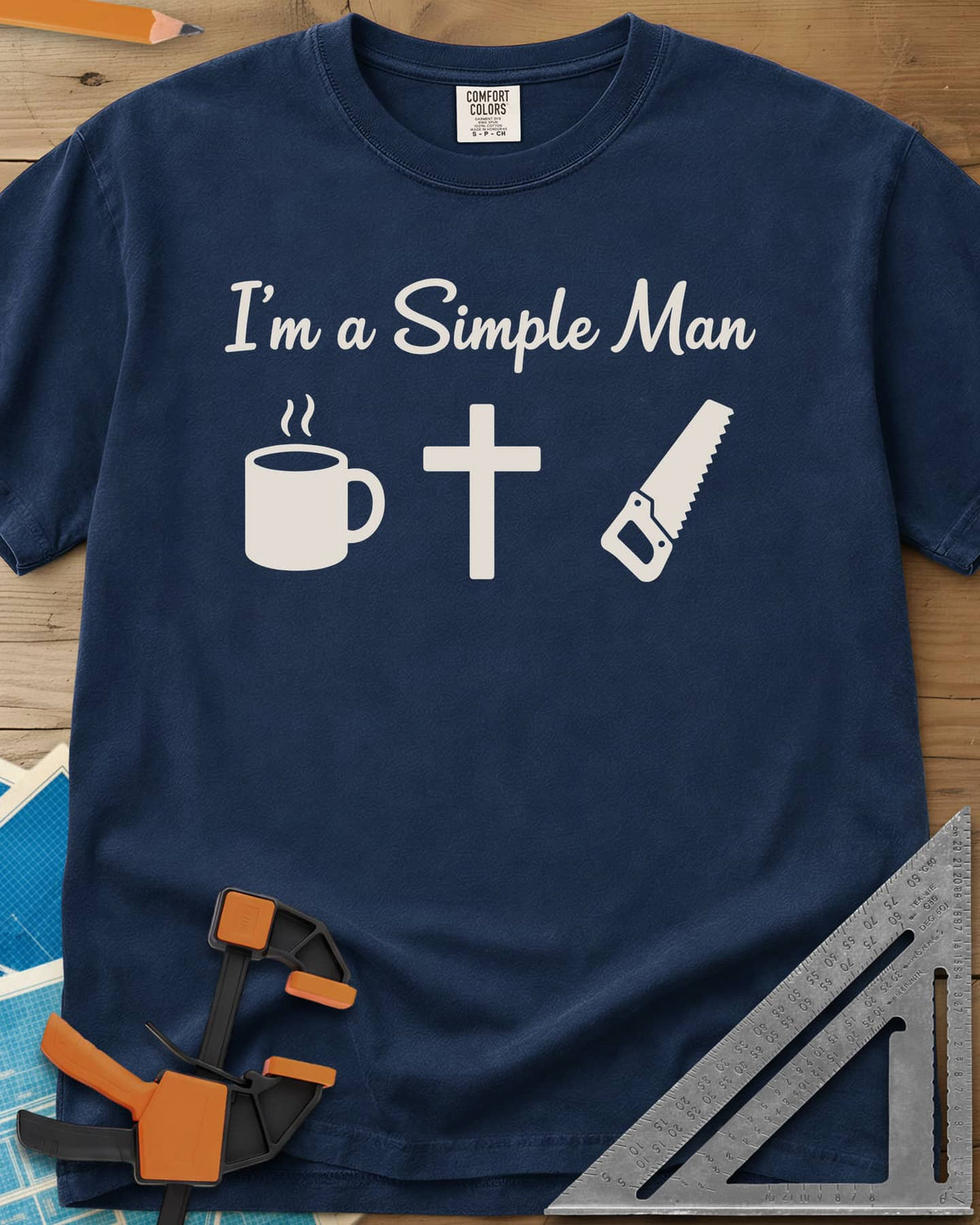 I’m A Simple Man Christian Woodworking heavyweight tee in Navy, script headline above a steaming coffee mug, a cross and a
