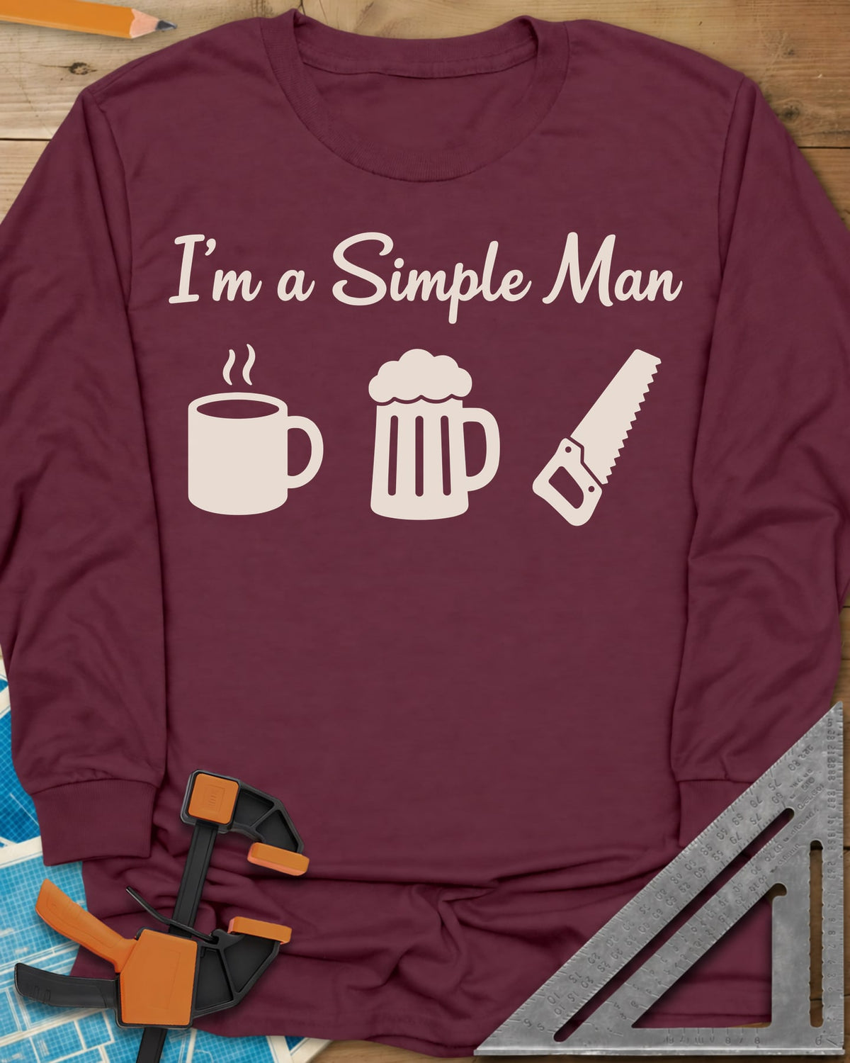 I’m A Simple Man Woodworking long sleeve shirt in Maroon, script headline over a steaming coffee mug, a beer mug and a