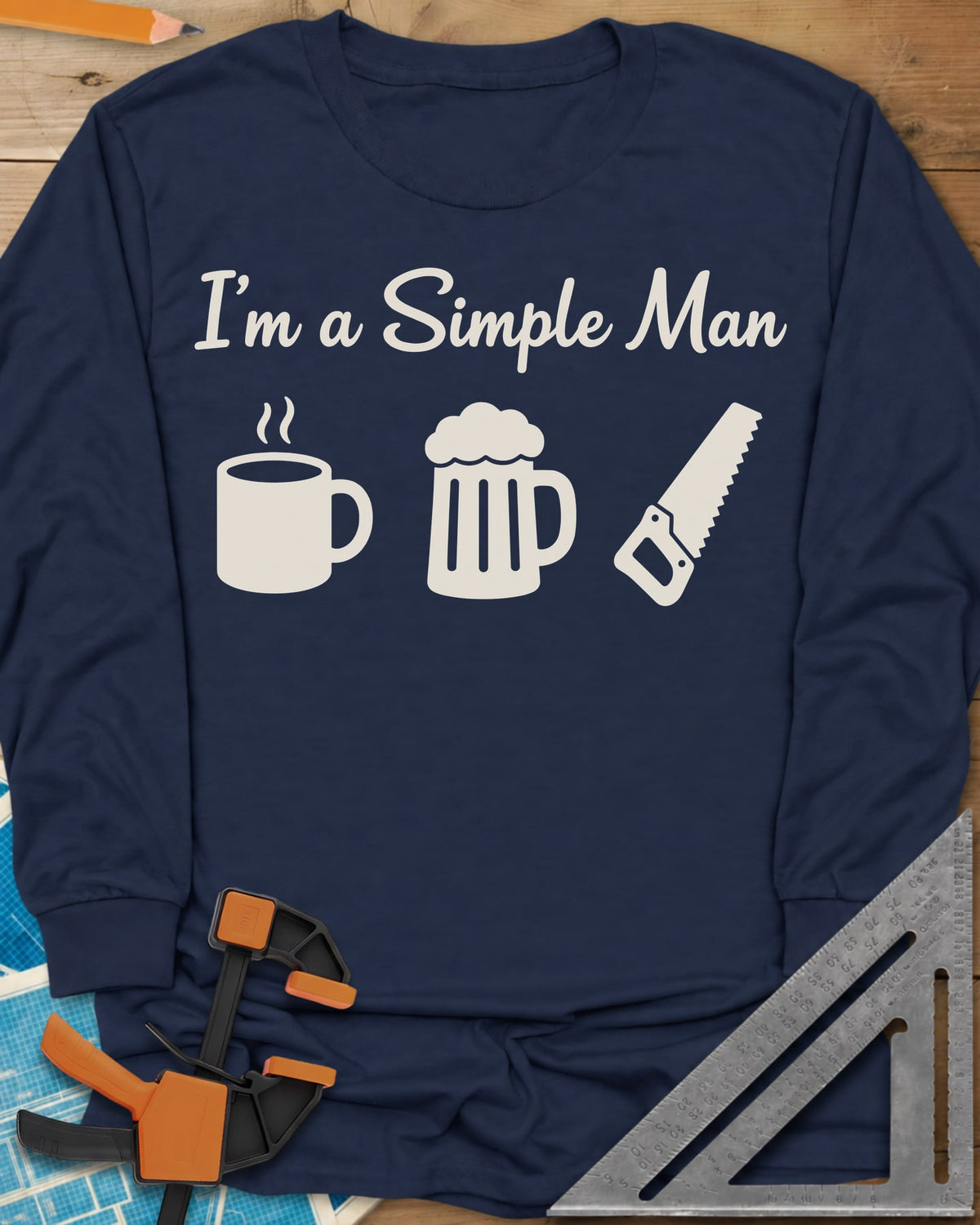 I’m A Simple Man Woodworking long sleeve shirt in Navy, script headline over a steaming coffee mug, a beer mug and a handsaw