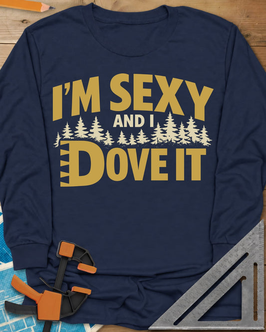 I'm Sexy and I Dove It long sleeve shirt in Navy, gold block lettering, a row of pine trees and a notched D