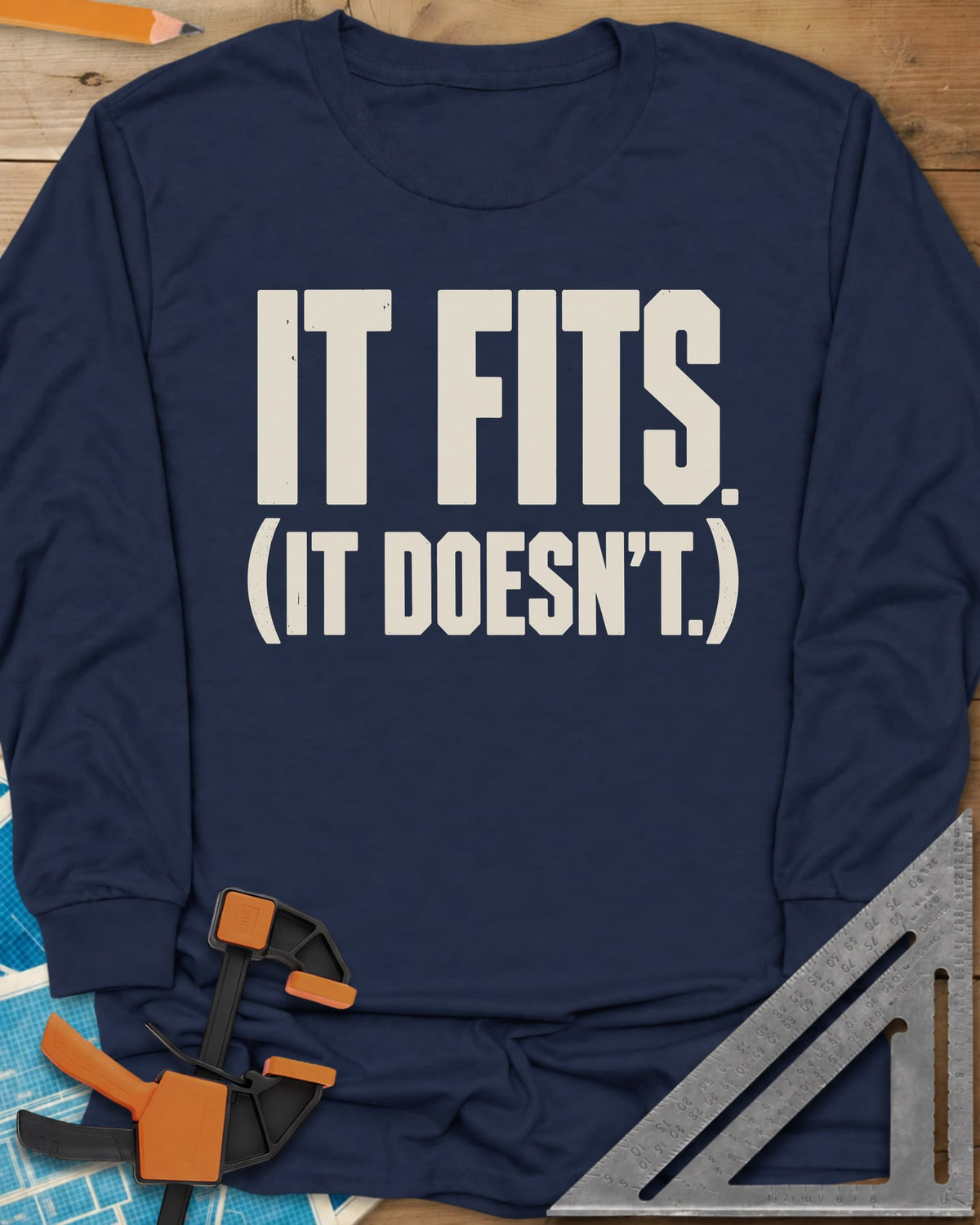 It Fits long sleeve shirt in Navy, plain bold block lettering with a bracketed second line