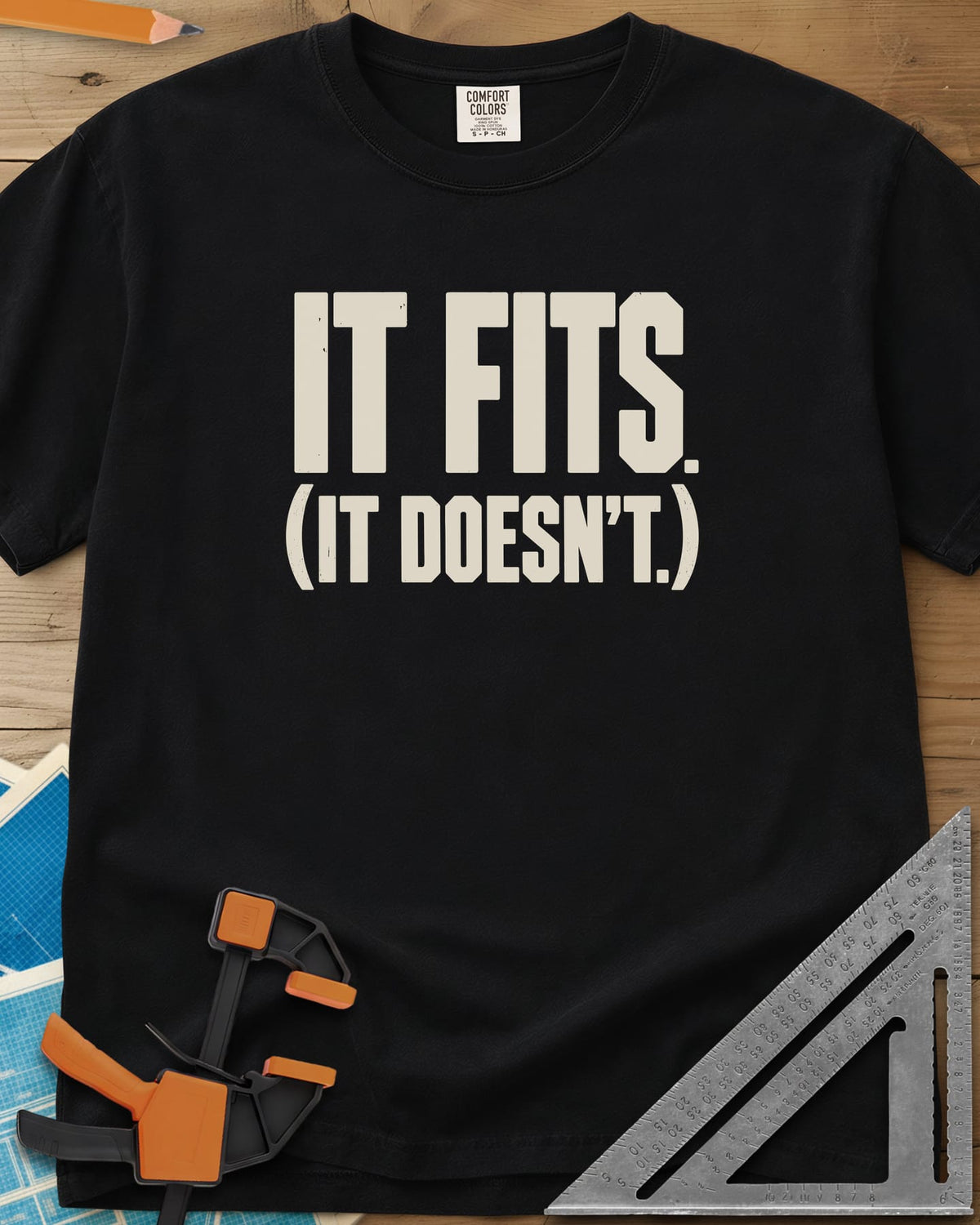 It Fits heavyweight tee in Black, plain bold block lettering with a bracketed second line