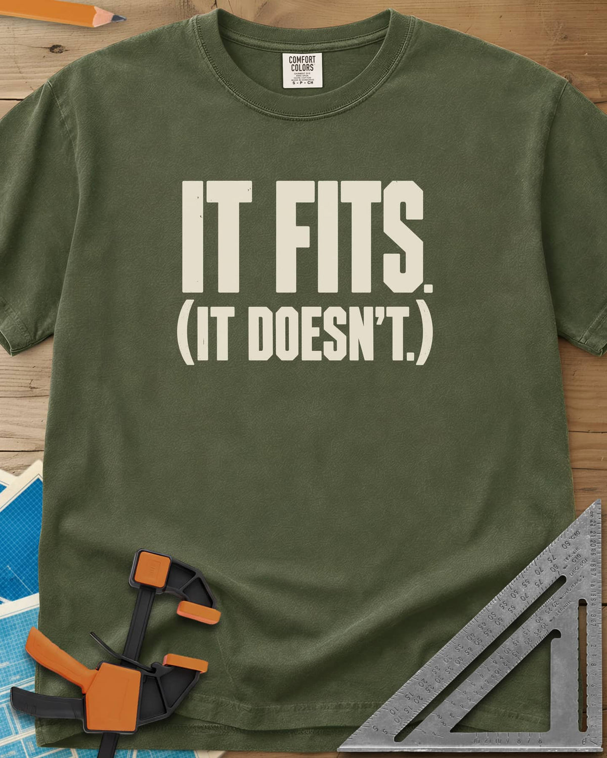 It Fits heavyweight tee in Hemp, plain bold block lettering with a bracketed second line