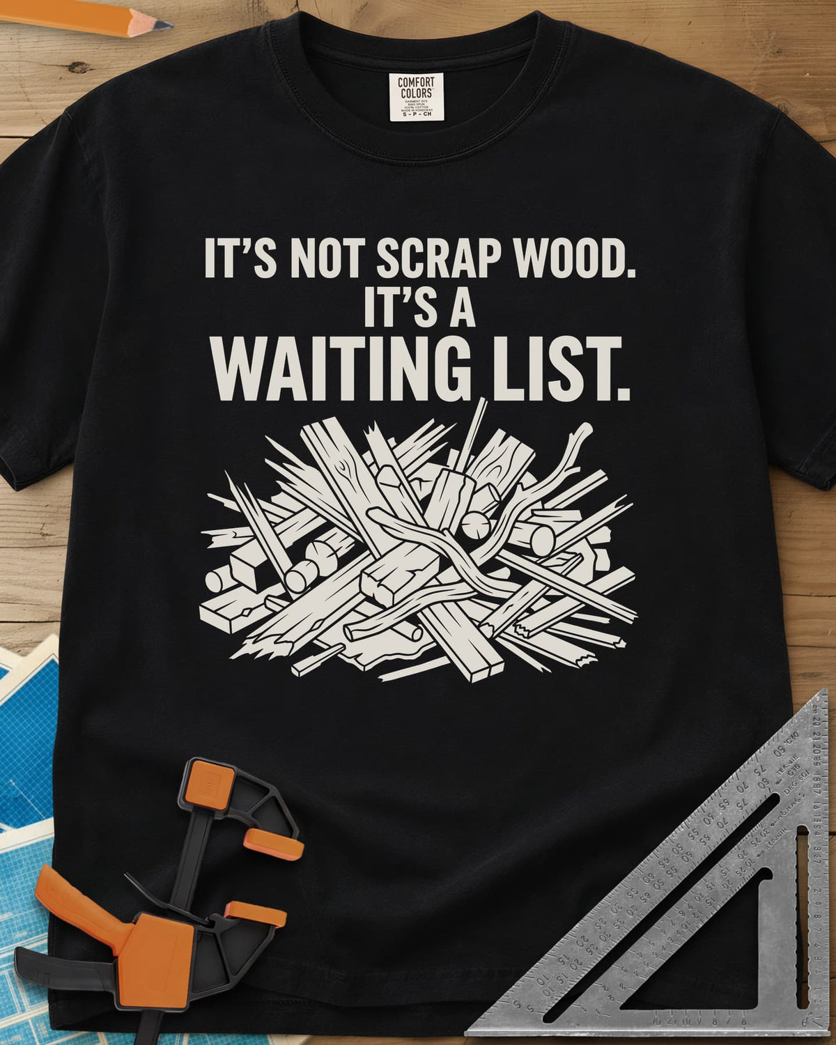 It's A Waiting List heavyweight tee in Black, a tangled heap of scrap boards, offcuts and branches