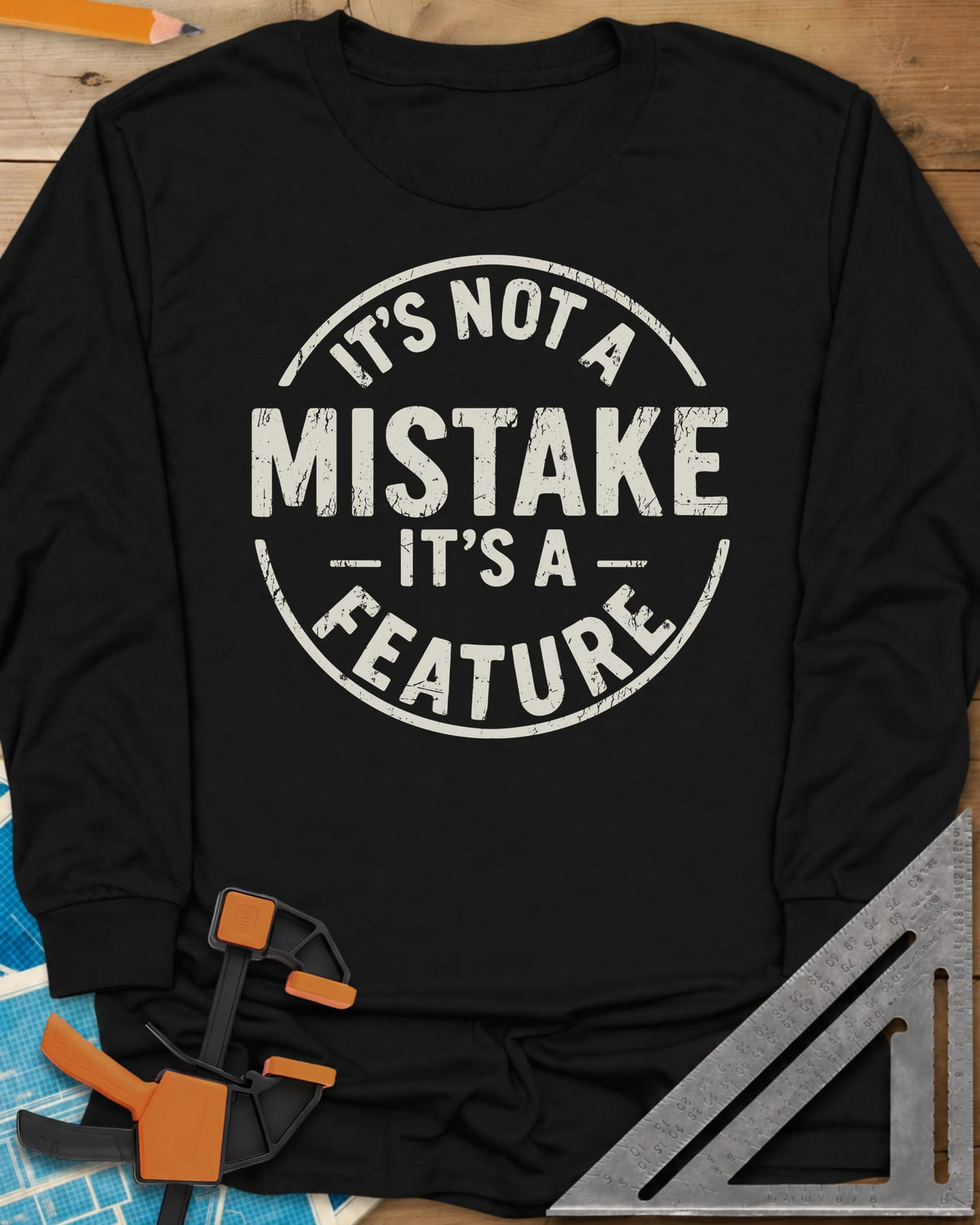 It's Not a Mistake long sleeve shirt in Black, a worn circular stamp with MISTAKE in large letters at the center