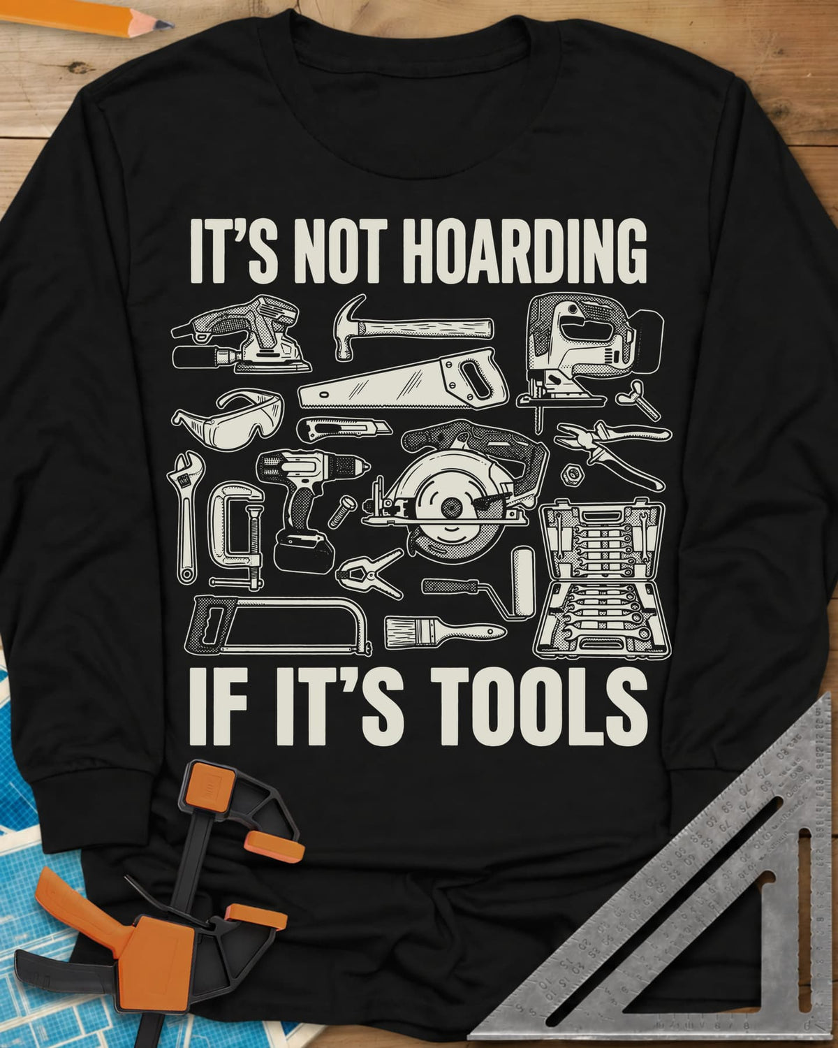 It's Not Hoarding long sleeve shirt in Black, a crowd of line-drawn tools around a circular saw and drill