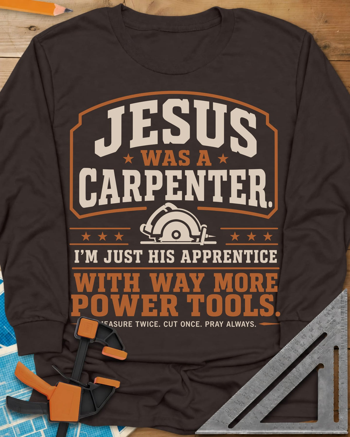 Jesus Was A Carpenter long sleeve shirt in Dark Chocolate, a bordered crest with stars and a small circular saw