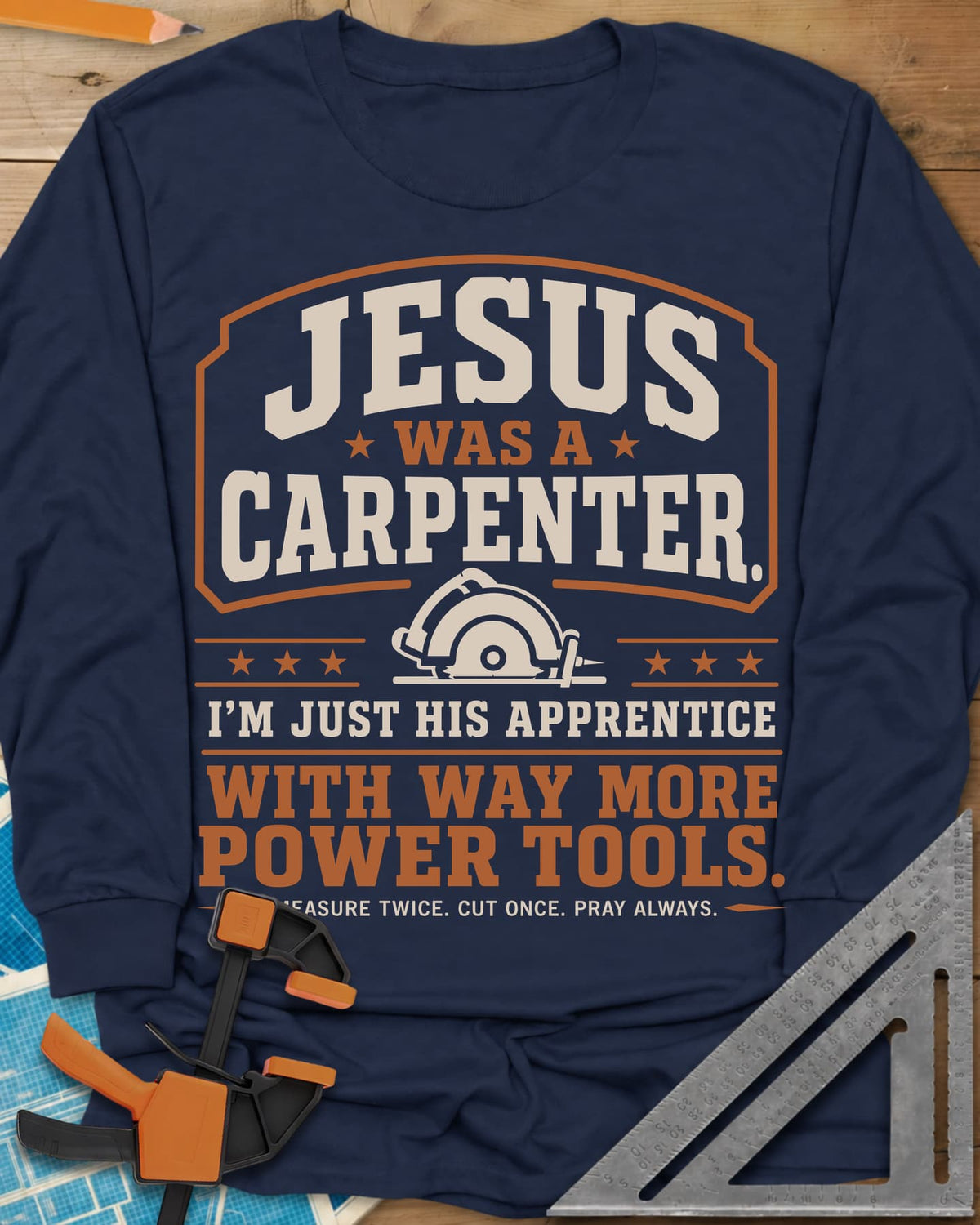 Jesus Was A Carpenter long sleeve shirt in Navy, a bordered crest with stars and a small circular saw
