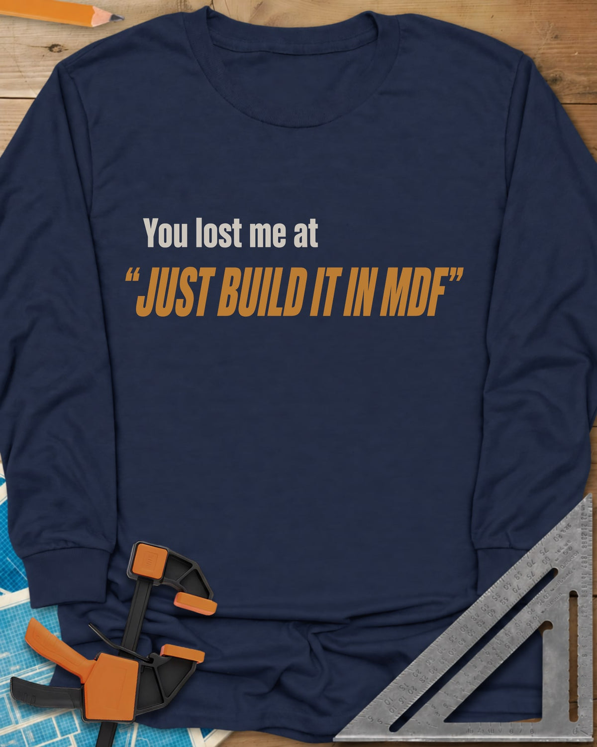 Just Build It In MDF long sleeve shirt in Navy, small plain text over bold italic lettering, no graphic