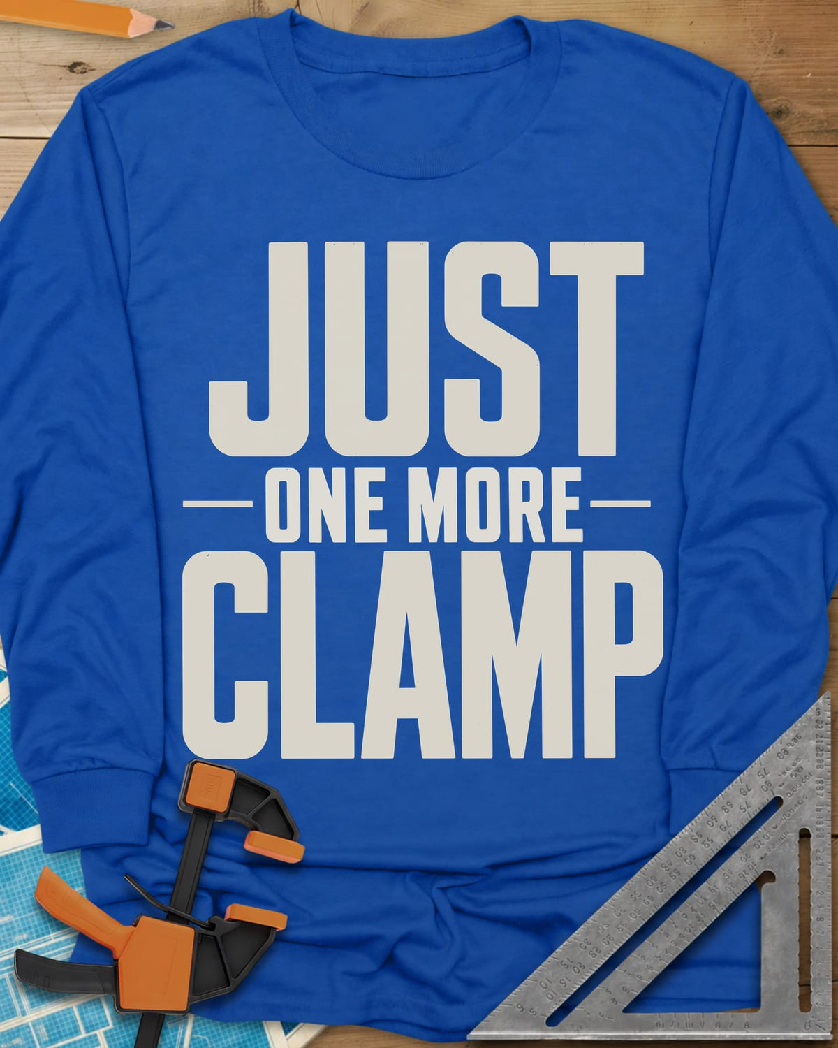 Just One More long sleeve shirt in Royal, bold stacked block letters with a thin line divider