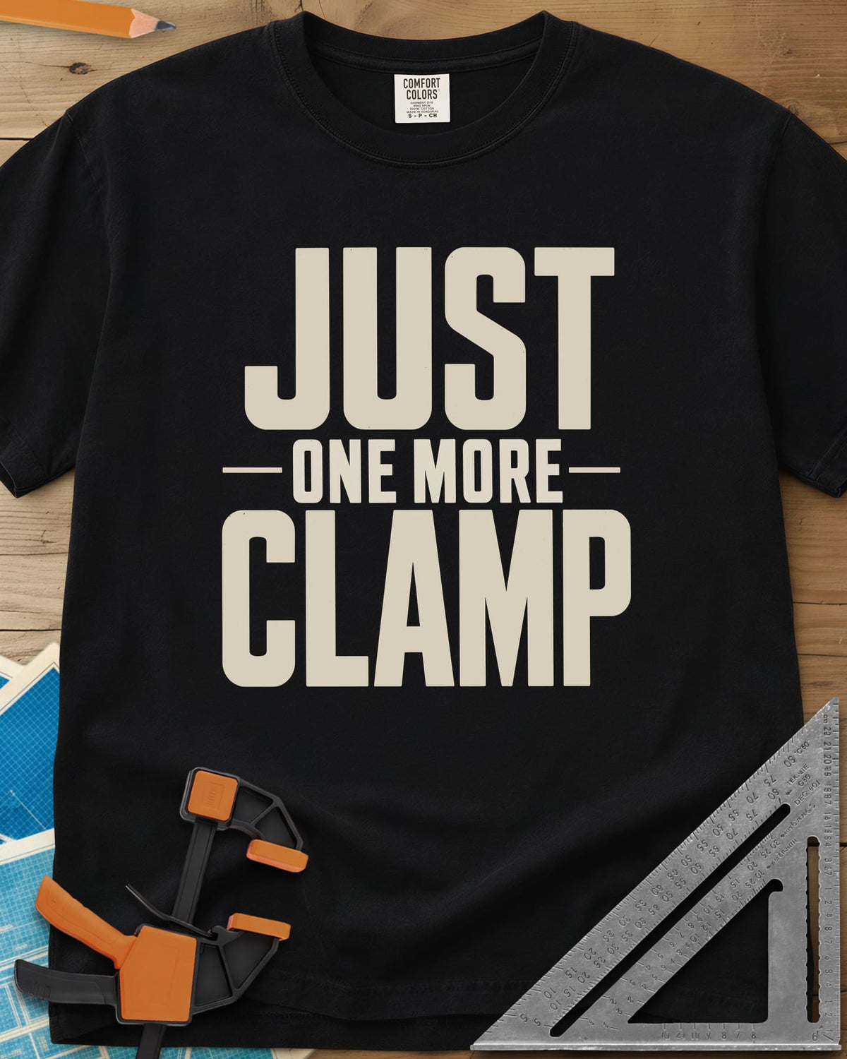 Just One More heavyweight tee in Black, bold stacked block letters with a thin line divider
