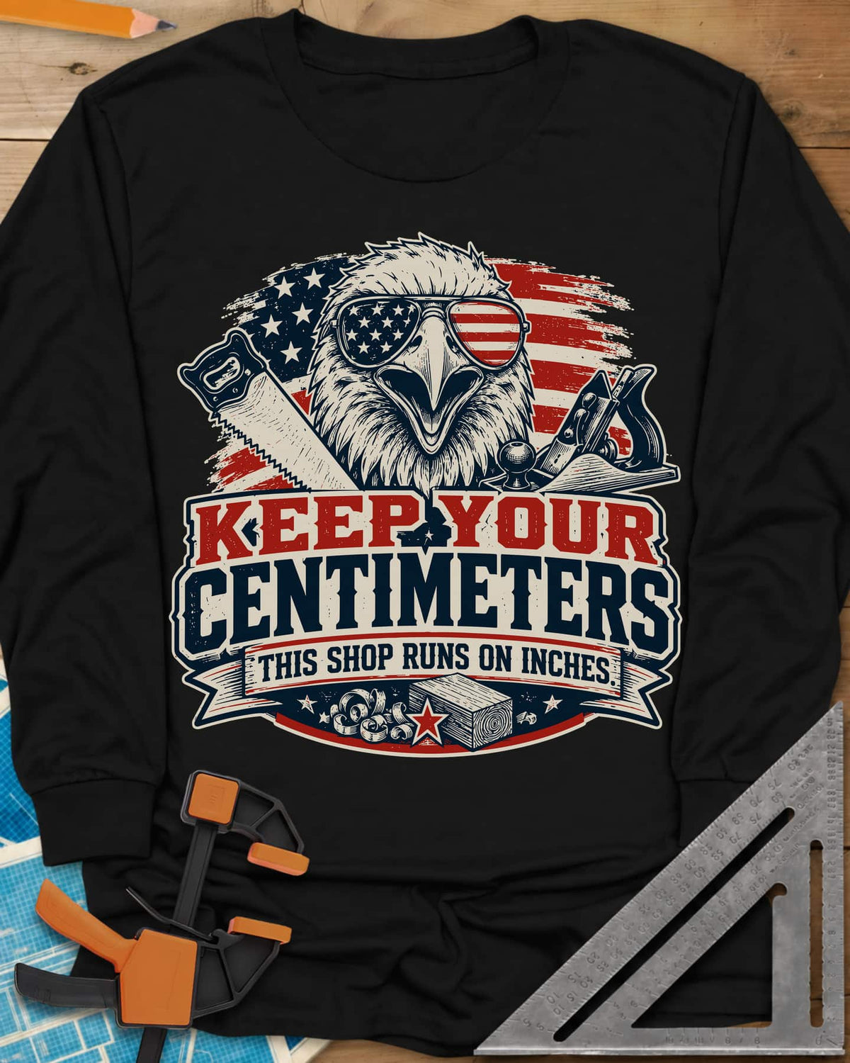 Keep Your Centimeters long sleeve shirt in Black, an eagle in flag sunglasses with a handsaw, plane and banner