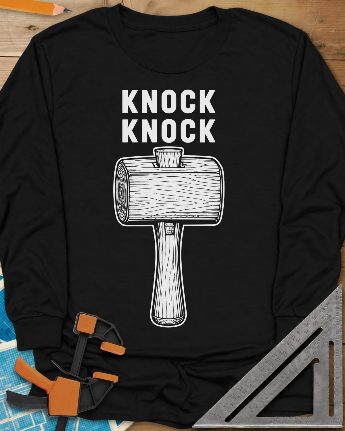 Knock Knock long sleeve shirt in Black, a wooden mallet drawn in fine linework under two words