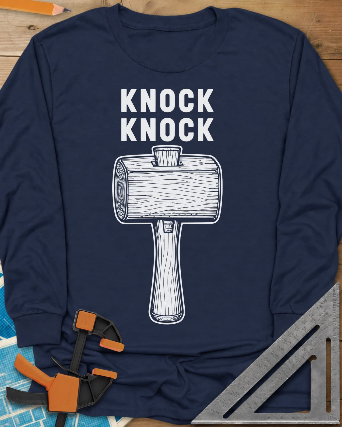 Knock Knock long sleeve shirt in Navy, a wooden mallet drawn in fine linework under two words