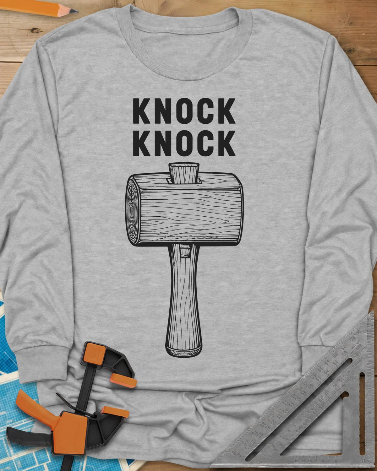 Knock Knock long sleeve shirt in Sport Grey, a wooden mallet drawn in fine linework under two words