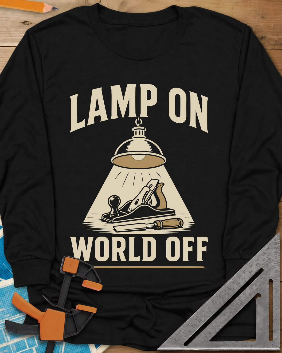 Lamp On World Off long sleeve shirt in Black, a pendant shop lamp lighting a hand plane and chisel
