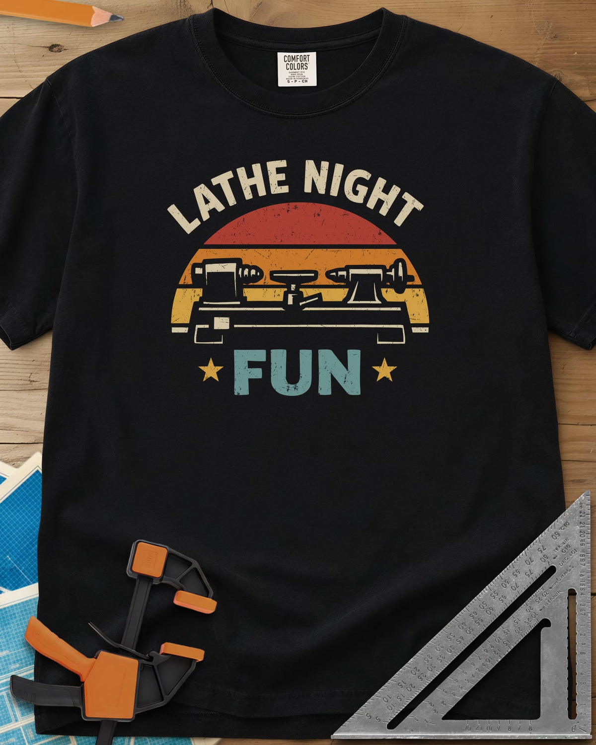 Lathe Night Fun heavyweight tee in Black, a retro striped sunset behind a wood lathe with stars