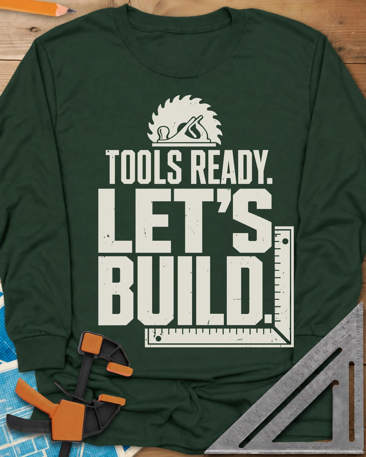 Let'S Build long sleeve shirt in Forest Green, a saw blade and hand plane over a framing square