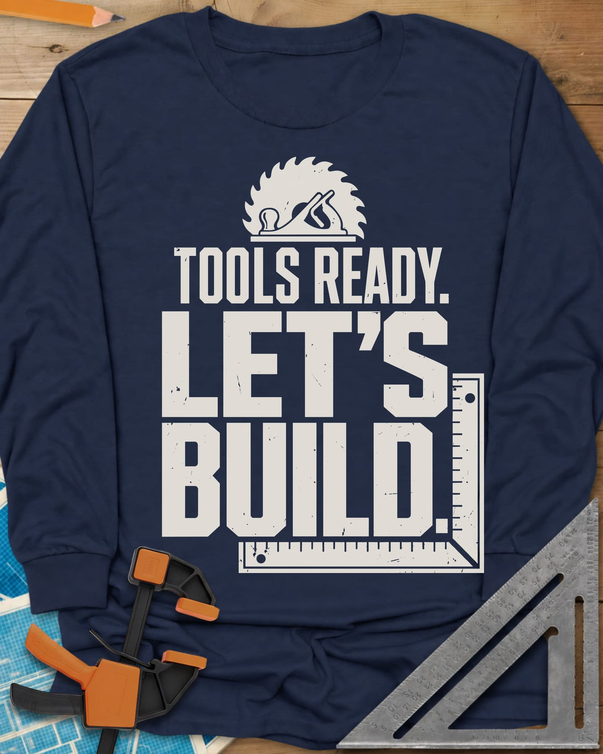 Let'S Build long sleeve shirt in Navy, a saw blade and hand plane over a framing square