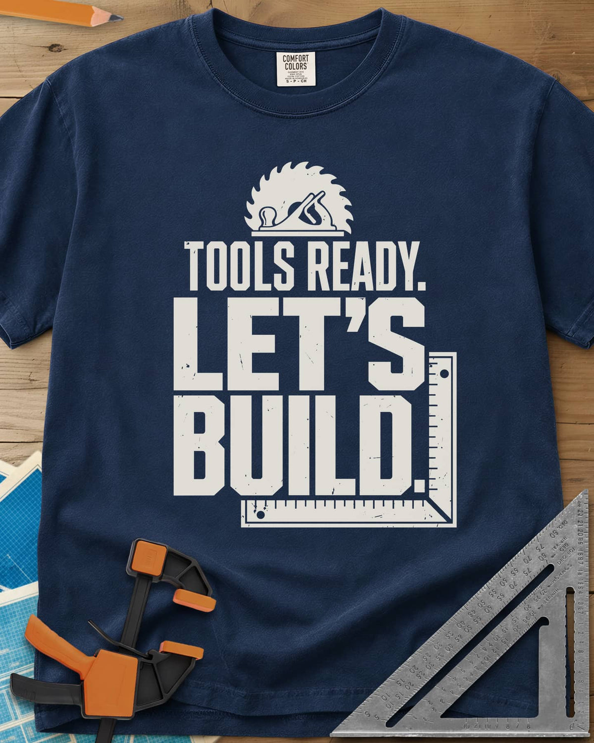 Let'S Build heavyweight tee in Navy, a saw blade and hand plane over a framing square