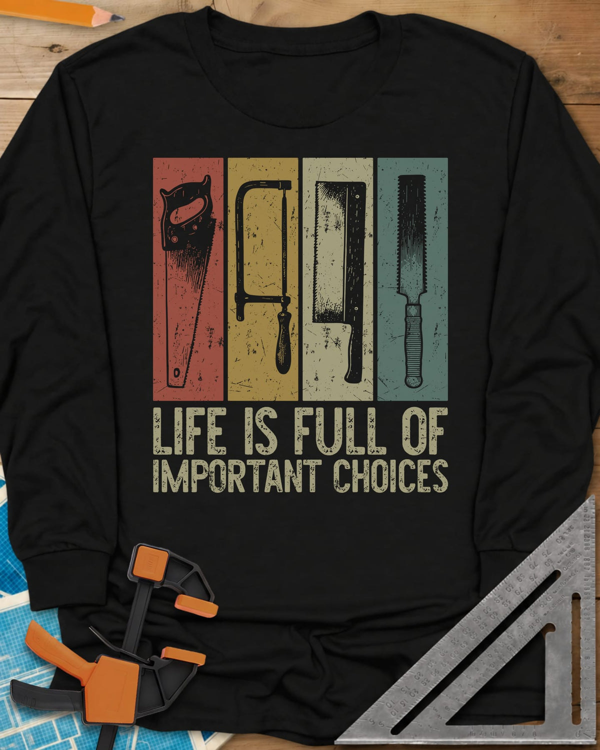 Life Is Full Of Important Choices long sleeve shirt in Black, four hand saws in rust, mustard, cream and teal panels