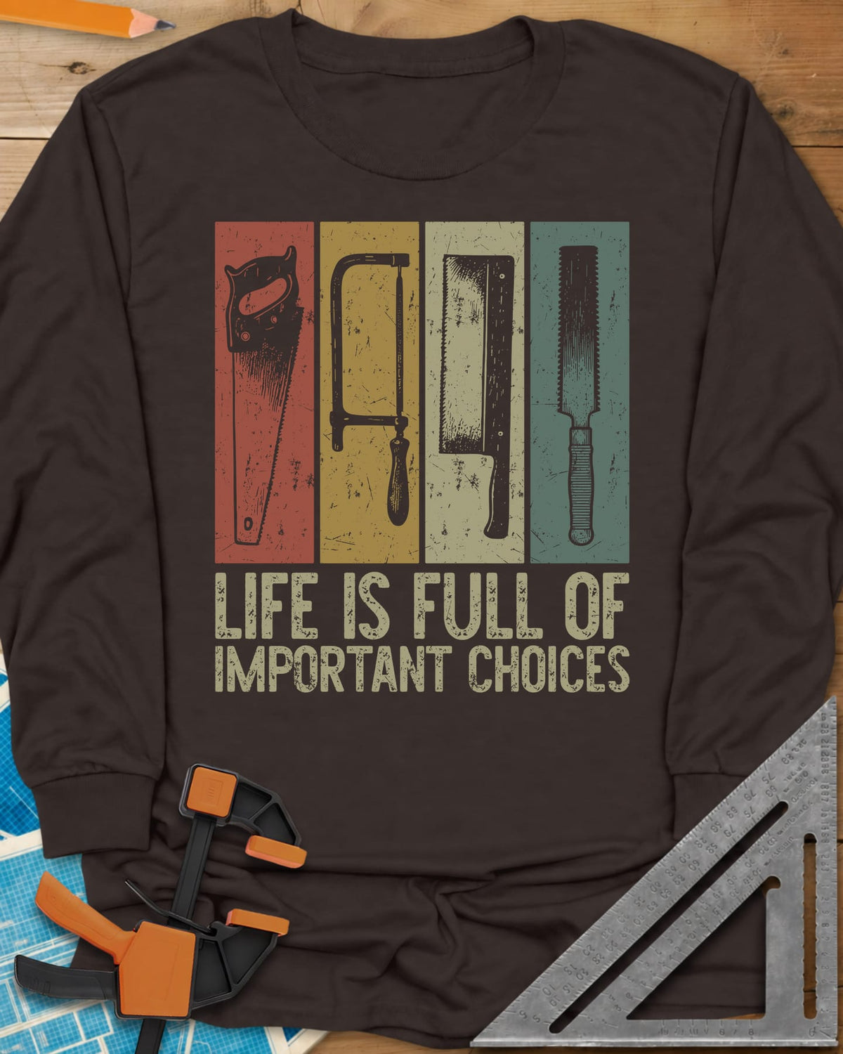 Life Is Full Of Important Choices long sleeve shirt in Dark Chocolate, four hand saws in rust, mustard, cream and teal panels