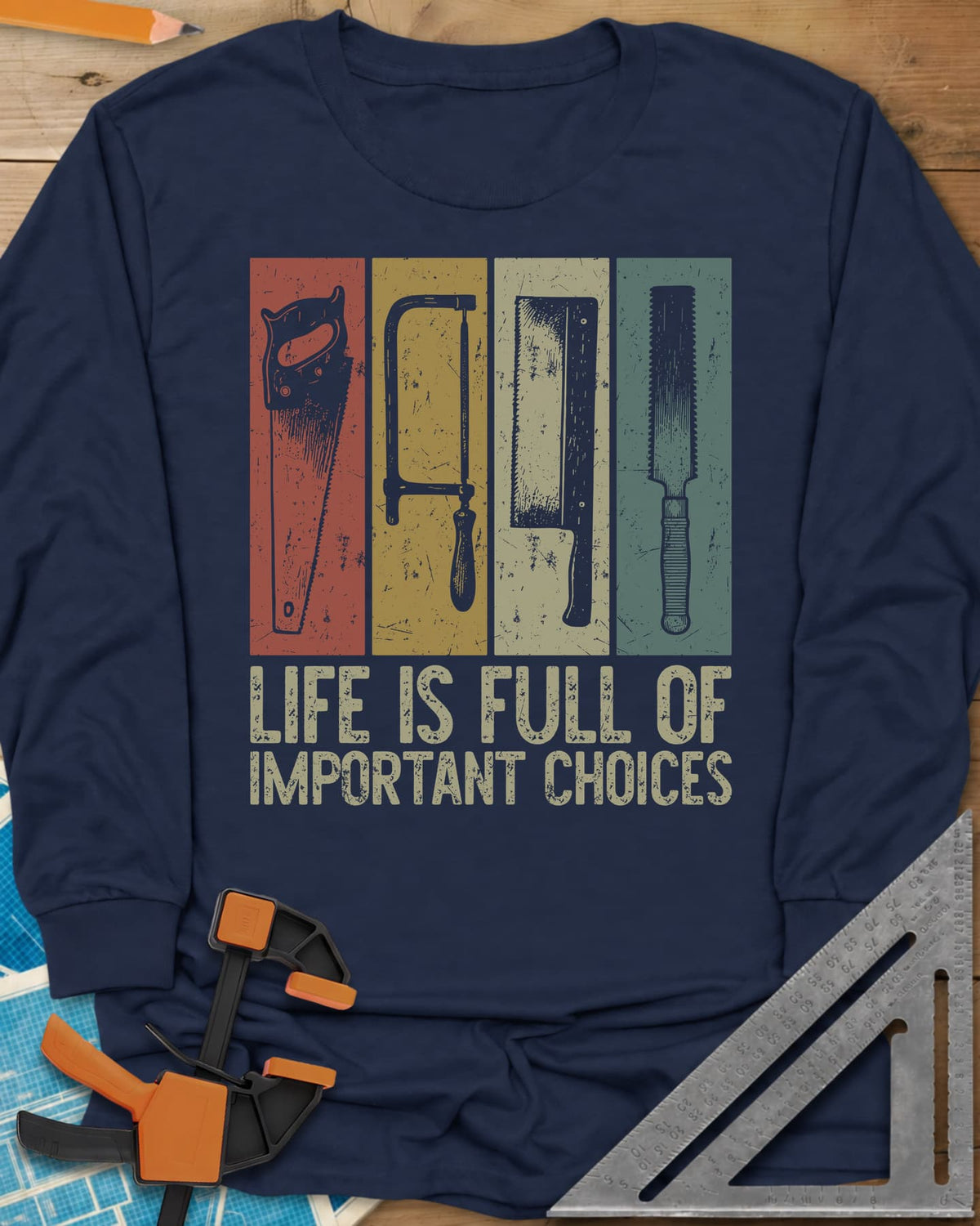 Life Is Full Of Important Choices long sleeve shirt in Navy, four hand saws in rust, mustard, cream and teal panels