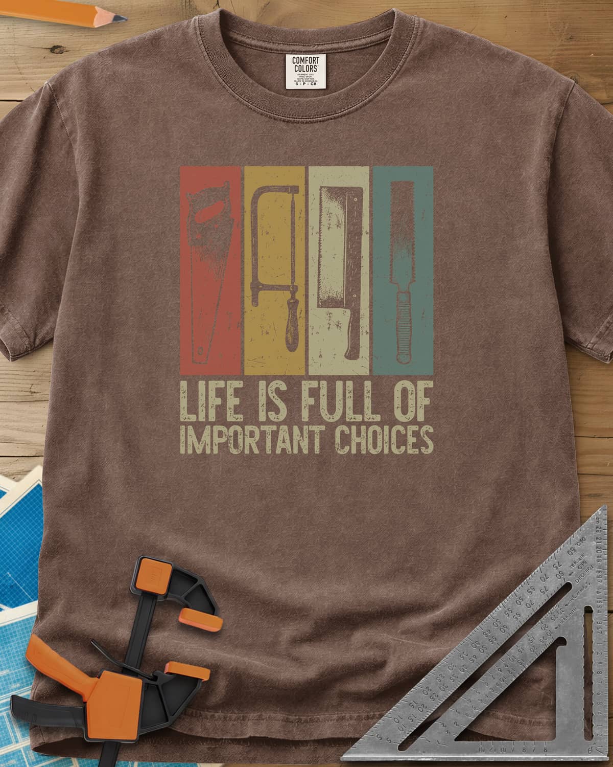 Life Is Full Of Important Choices heavyweight tee in Espresso, four hand saws in rust, mustard, cream and teal panels