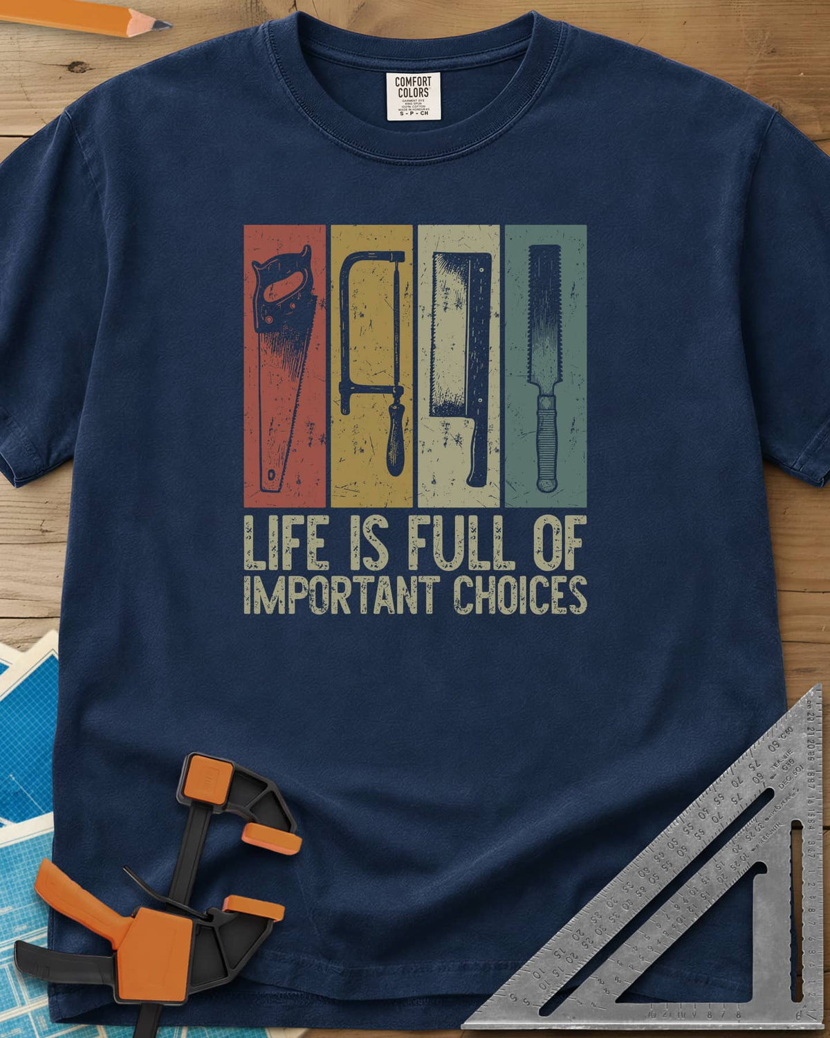 Life Is Full Of Important Choices heavyweight tee in Navy, four hand saws in rust, mustard, cream and teal panels
