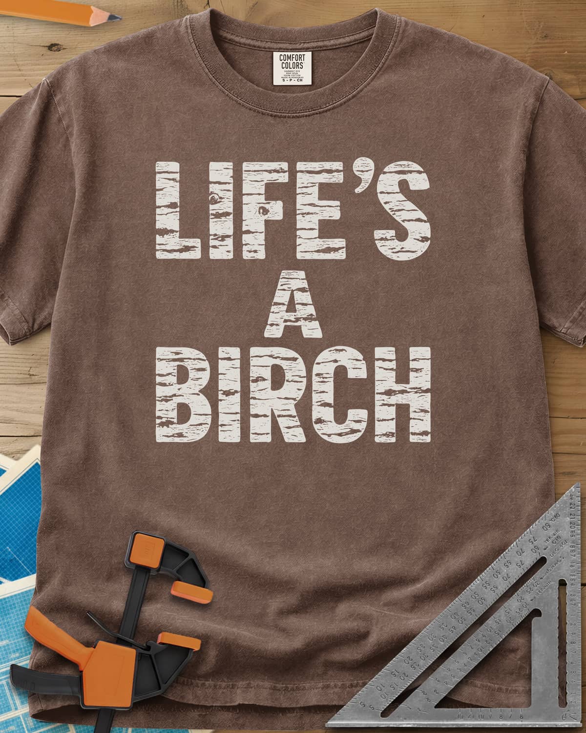 Life's a Birch heavyweight tee in Espresso, stacked block letters filled with white birch bark texture