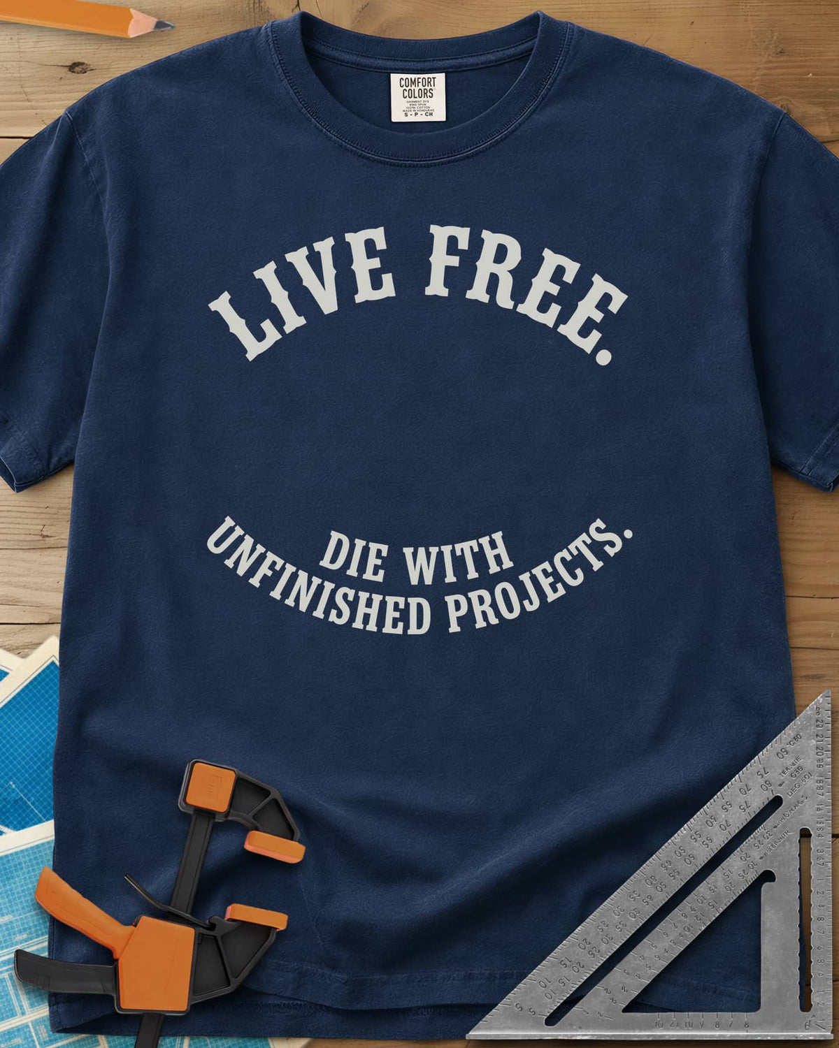 Live Free heavyweight tee in Navy, two curved lines of slab-serif capitals, no graphic
