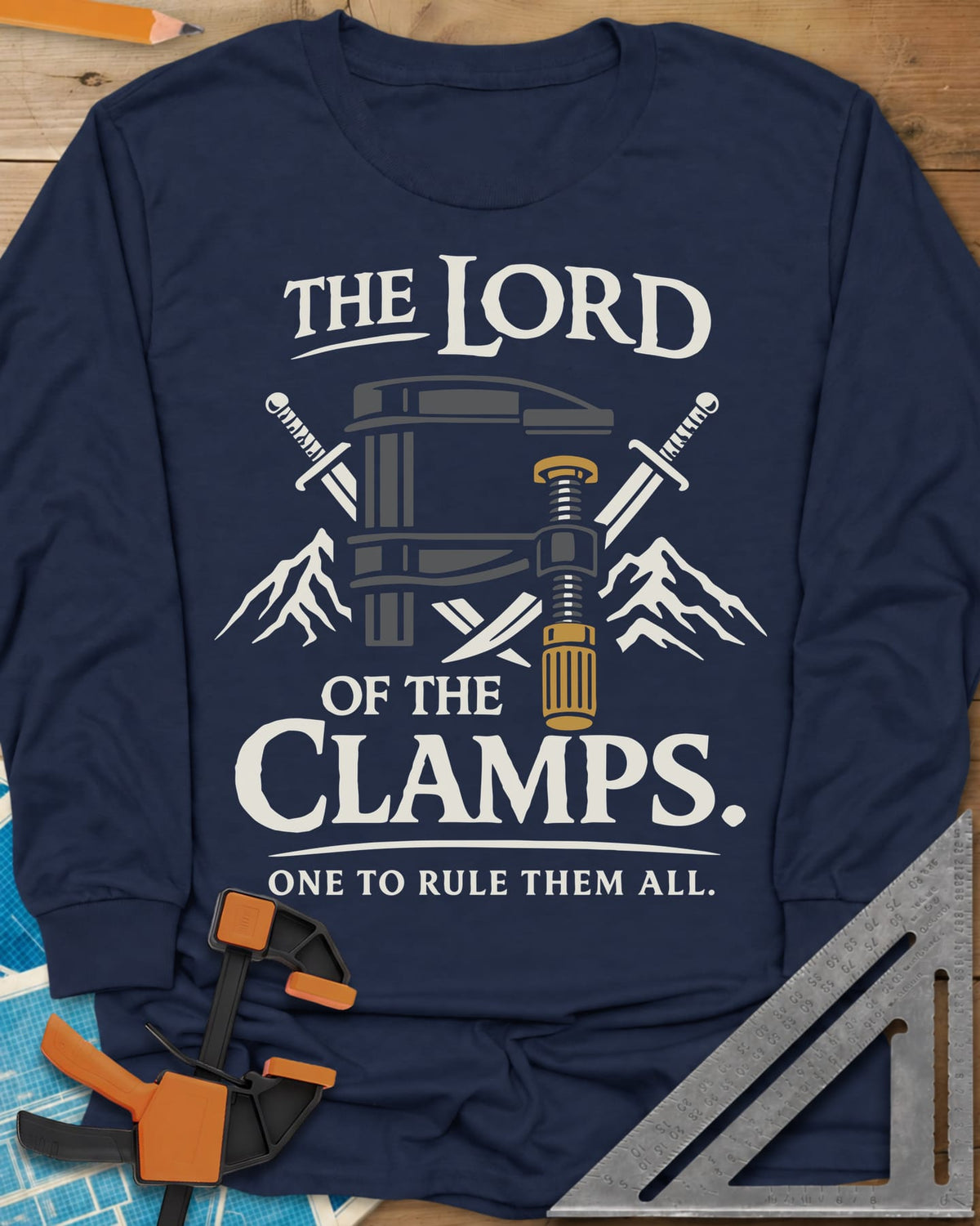 Lord Of The Clamps long sleeve shirt in Navy, a bar clamp between crossed swords and snowy mountain peaks