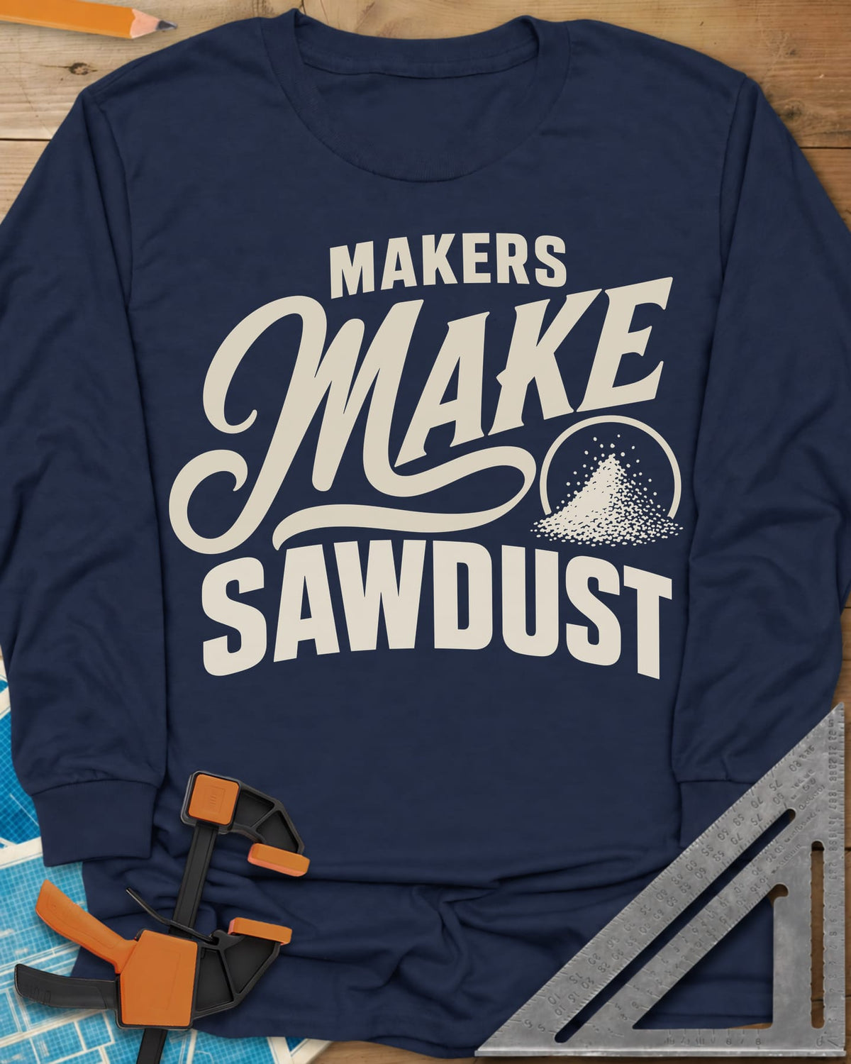 Make Sawdust long sleeve shirt in Navy, bold lettering with a script MAKE and a small pile of sawdust