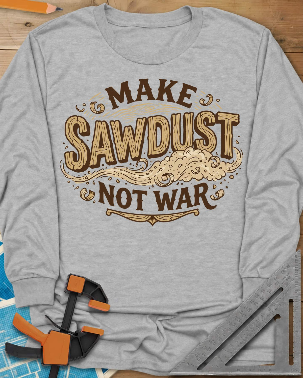 Make Sawdust Not War long sleeve shirt in Sport Grey, vintage badge lettering with a swirl of blowing sawdust