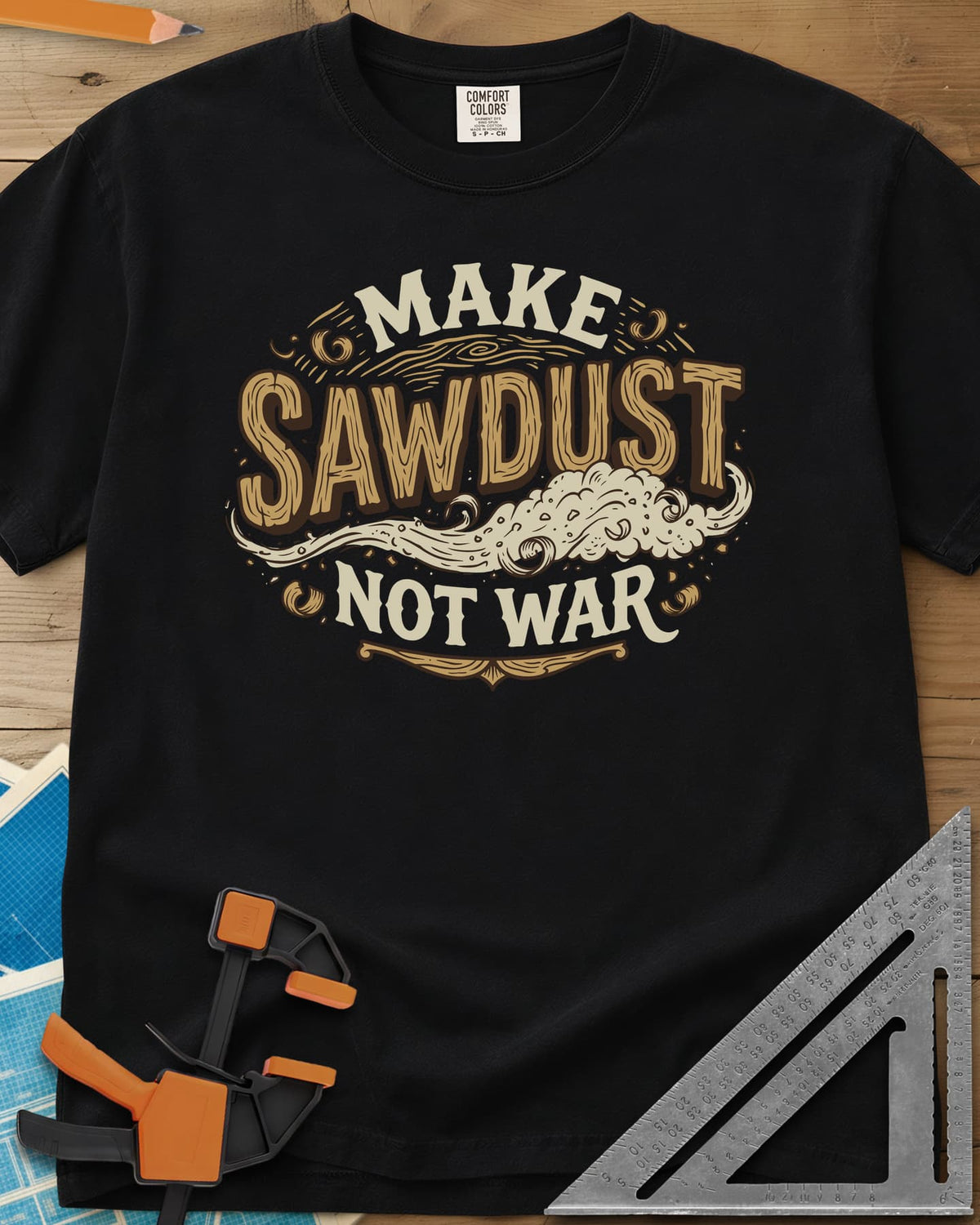 Make Sawdust Not War heavyweight tee in Black, vintage badge lettering with a swirl of blowing sawdust