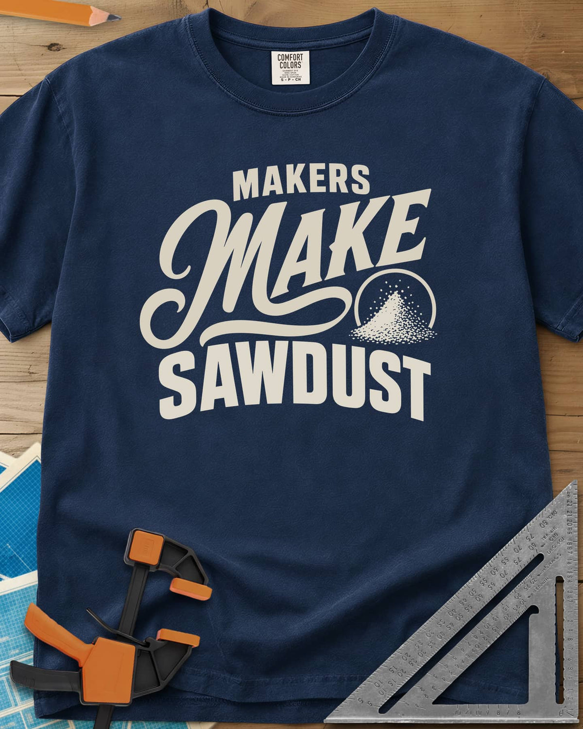 Make Sawdust heavyweight tee in Navy, bold lettering with a script MAKE and a small pile of sawdust