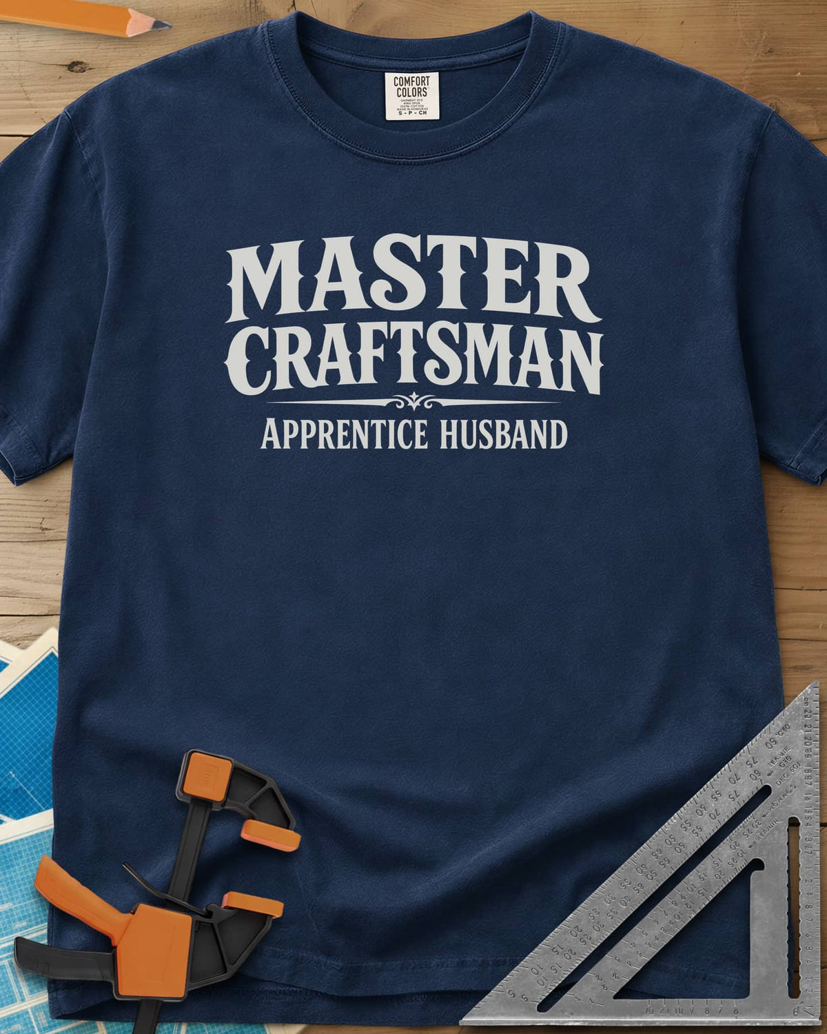 Master Craftsman Apprentice Husband heavyweight tee in Navy, bold old-style lettering with a small ornamental divider