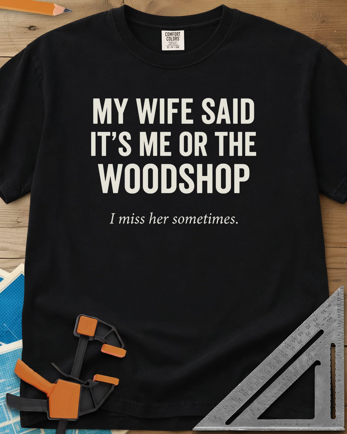 Me Or The Woodshop heavyweight tee in Black, plain block capitals with a small italic line underneath