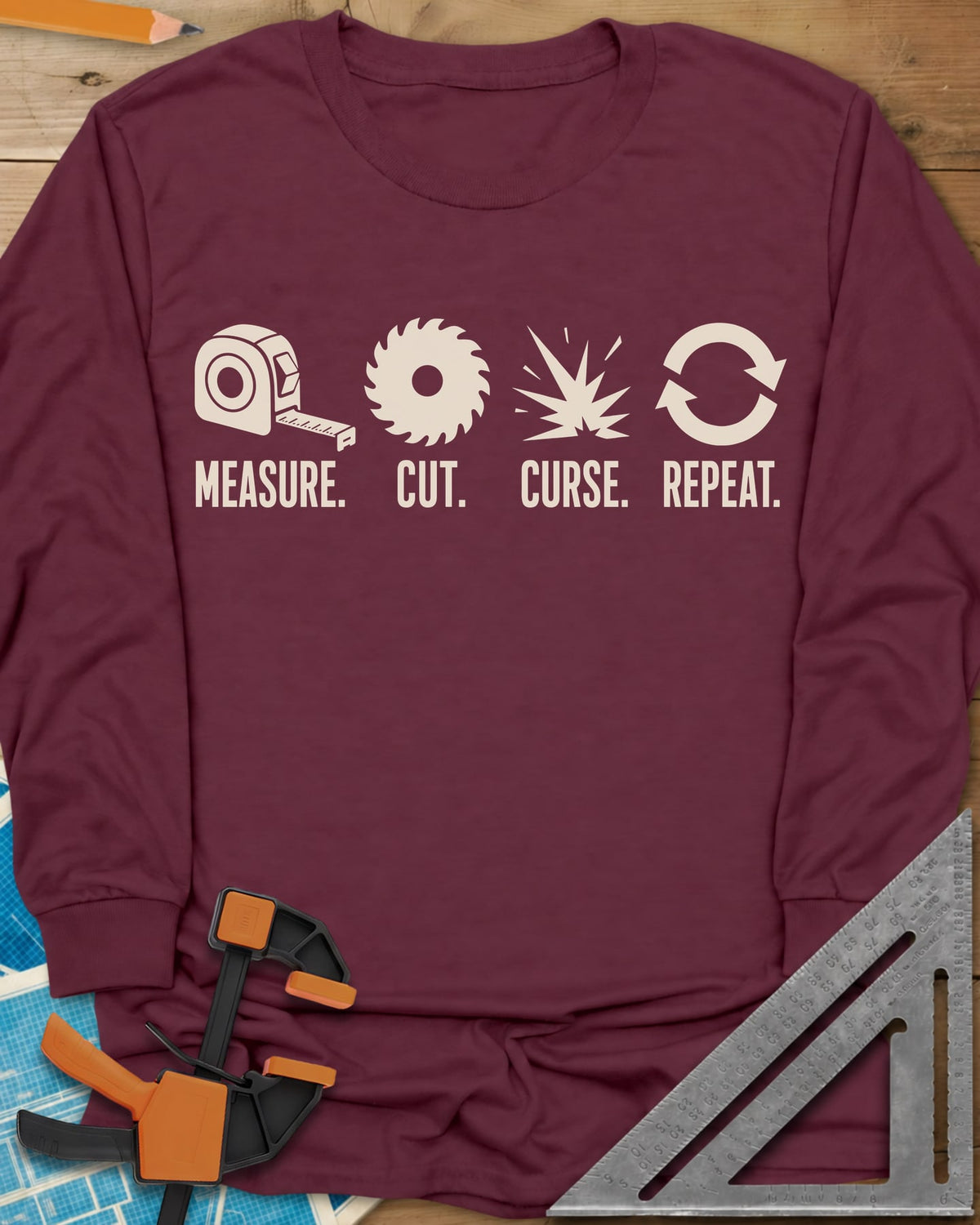 Measure Cut Repeat long sleeve shirt in Maroon, four icons: tape measure, saw blade, spark burst, repeat arrows