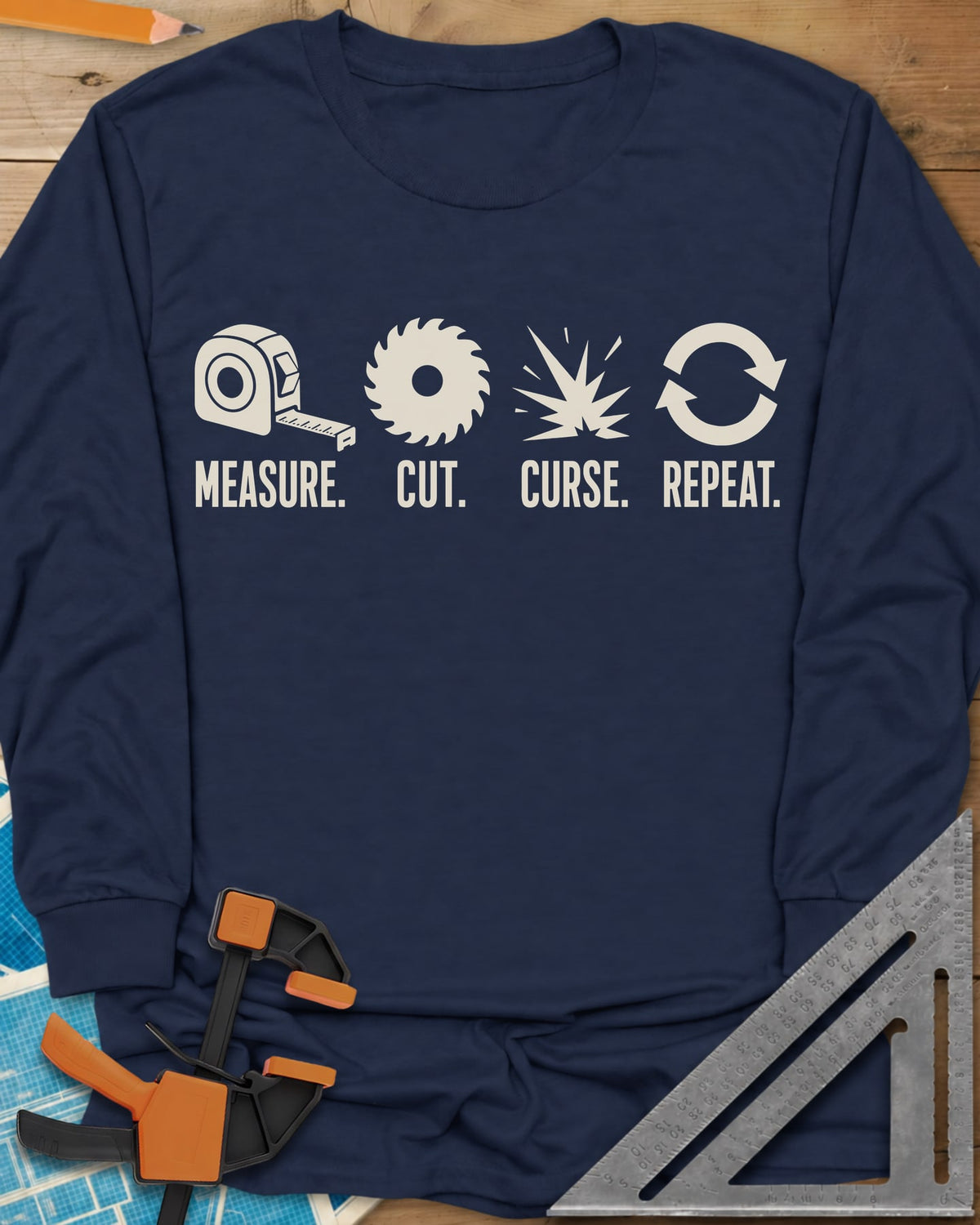 Measure Cut Repeat long sleeve shirt in Navy, four icons: tape measure, saw blade, spark burst, repeat arrows