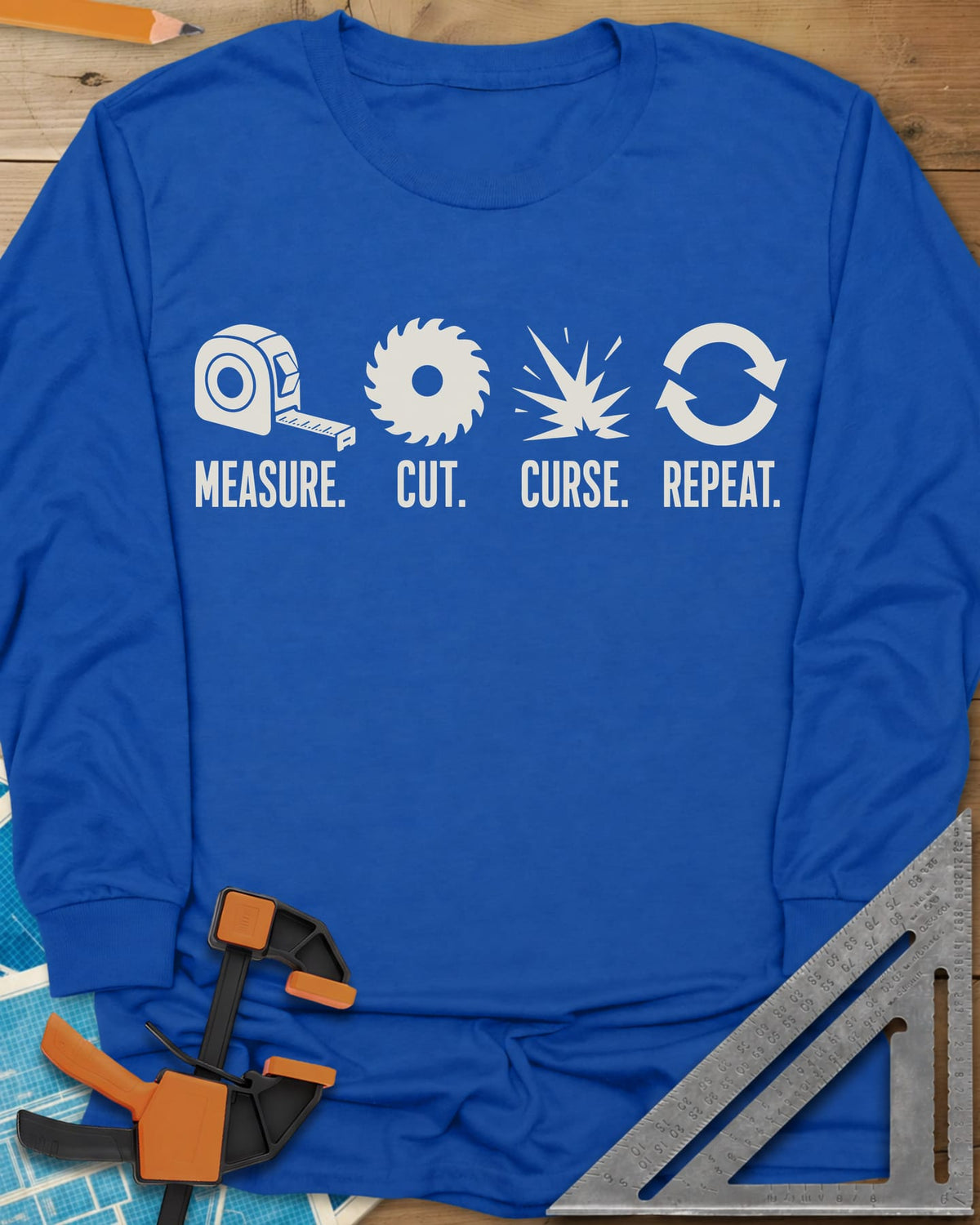 Measure Cut Repeat long sleeve shirt in Royal, four icons: tape measure, saw blade, spark burst, repeat arrows