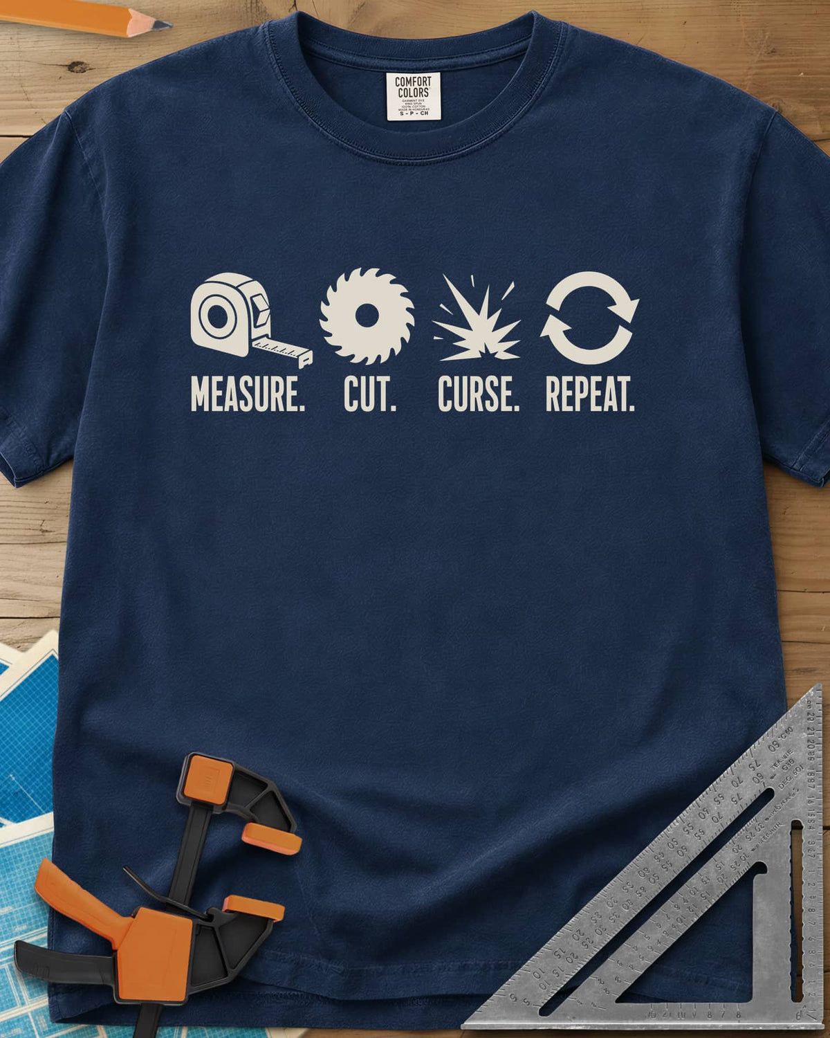 Measure Cut Repeat heavyweight tee in Navy, four icons: tape measure, saw blade, spark burst, repeat arrows