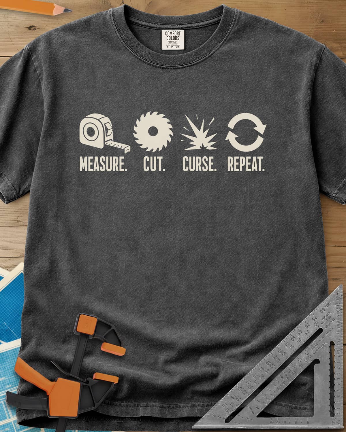 Measure Cut Repeat heavyweight tee in Pepper, four icons: tape measure, saw blade, spark burst, repeat arrows
