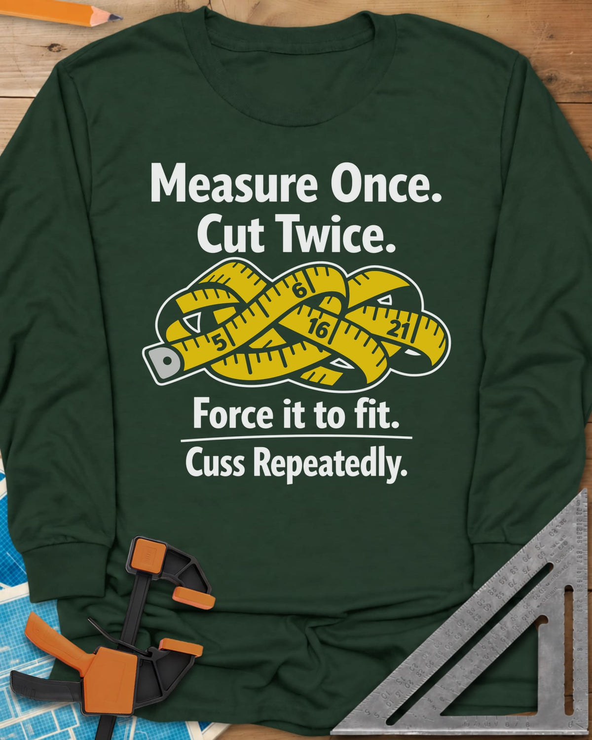 Measure Once long sleeve shirt in Forest Green, a yellow tape measure tied in a knot