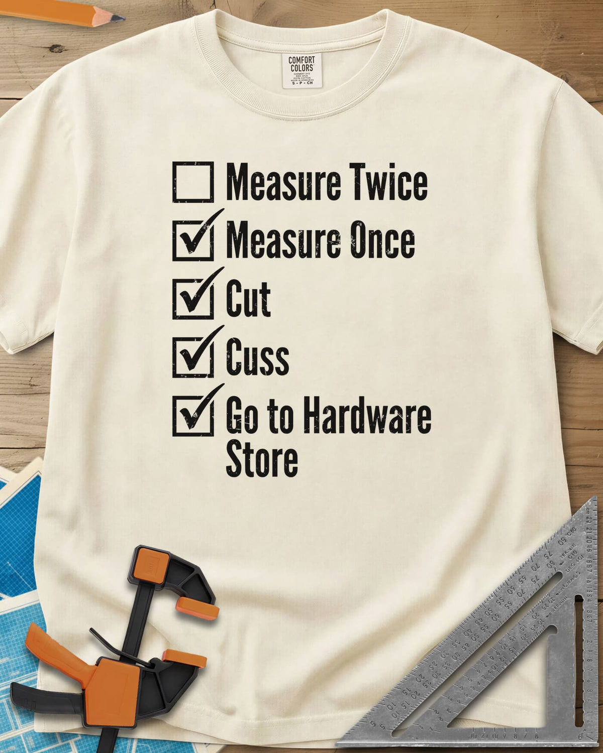 Measure Twice Checkbox heavyweight tee in Ivory, a five-line checklist with only the measure twice box left empty