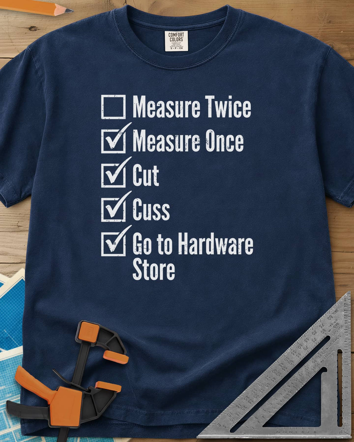 Measure Twice Checkbox heavyweight tee in Navy, a five-line checklist with only the measure twice box left empty