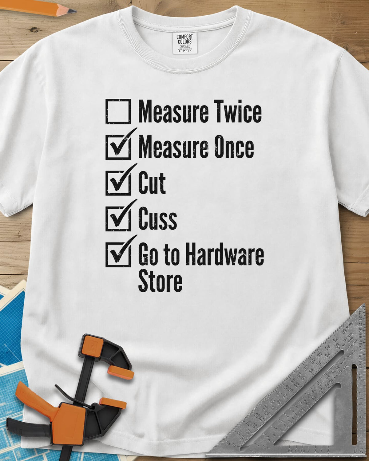 Measure Twice Checkbox heavyweight tee in White, a five-line checklist with only the measure twice box left empty